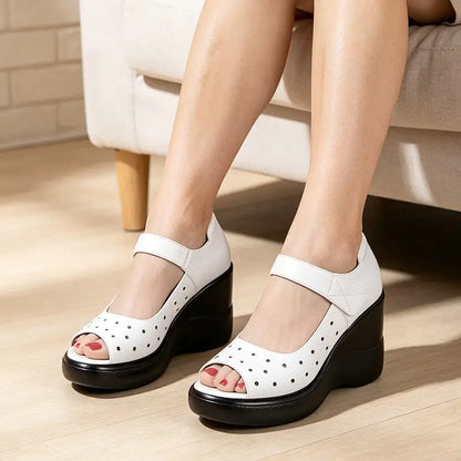 Vaudelle — Cutout-Wedge-Plateausandalen