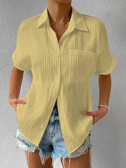 Céline — Bluse mit Hemdkragen und Knopfleiste in lockerer Passform