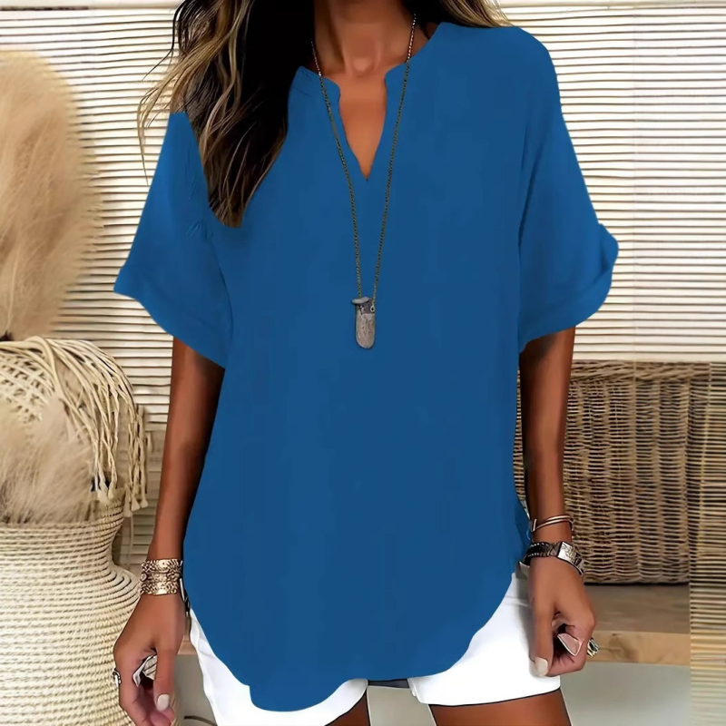 Thessaly — Locker Geschnittene Bluse mit Asymmetrischem Saum