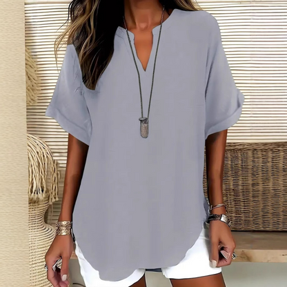 Thessaly — Locker Geschnittene Bluse mit Asymmetrischem Saum