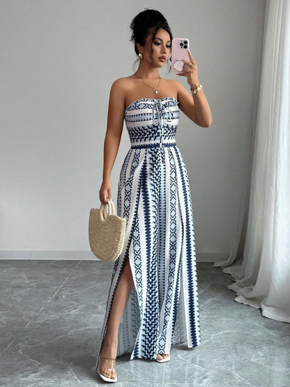 Vaelisse — Halter-Neck Jumpsuit mit geometrischem Druck und seitlichem Schlitz