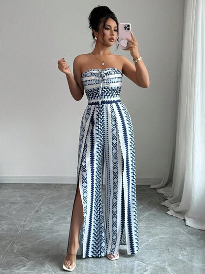 Vaelisse — Halter-Neck Jumpsuit mit geometrischem Druck und seitlichem Schlitz