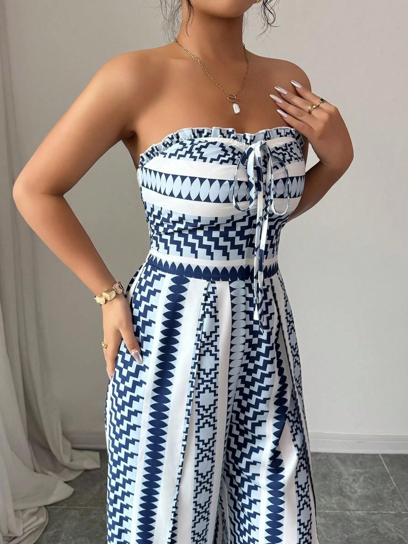 Vaelisse — Halter-Neck Jumpsuit mit geometrischem Druck und seitlichem Schlitz